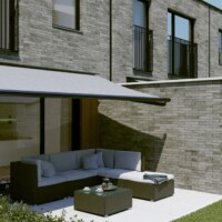 Knikarm zonwering geral Harol