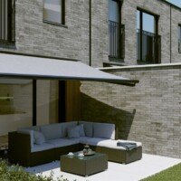 Knikarm zonwering geral Harol